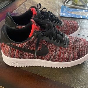 Black and red Nike air forces